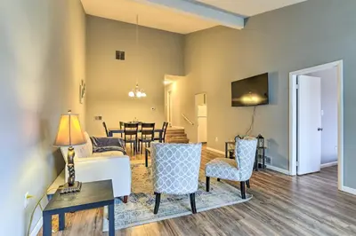a living room with a couch and a table at Inviting Poconos Getaway with Deck Ski and Hike! in Mount Pocono