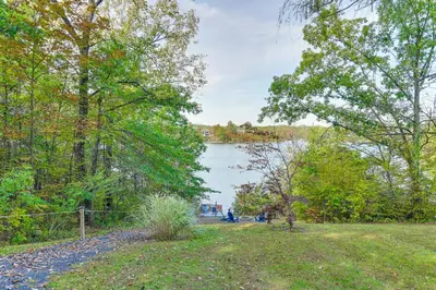 a view of a lake from a park with trees at Hot Tub Secluded Hideaway on Sleepy Hollow Lake in Athens