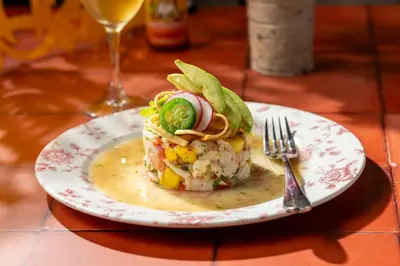 a plate with a sandwich on a table with a fork at Camelback Resort in Tannersville
