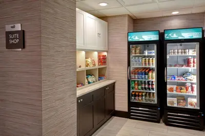 a large refrigerator in a store with food at Homewood Suites by Hilton Hartford / Southington CT in Southington