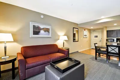 a living room with a couch and a table at Homewood Suites by Hilton Hartford / Southington CT in Southington