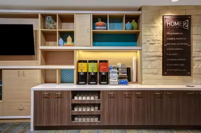 a pharmacyacist with a counter with bottles ofaceuticalaceuticalaceuticalaceuticalaceuticalaceuticalaceutical at Home2 Suites East Hanover, NJ in East Hanover