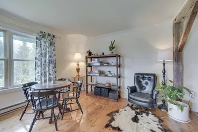 a dining room with a table and chairs at Burlington Flats House Less Than 13 Mi to Cooperstown! in Fly Creek