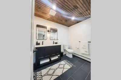 a bathroom with a sink and a toilet at Pinewood Lodge - Catskills, Windham Mountain, Hunter Mountain in Catskill