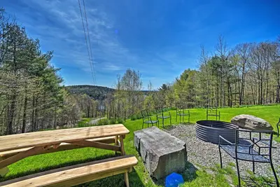 a park with a bench and a fire pit at Fire Pit and Gas Grill Secluded Studio in Milford! in Milford