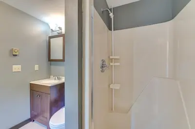 a bathroom with a shower and a toilet and a sink at 4 Mi to Windham Mountain Ski Getaway! in Windham