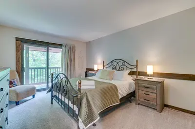 a bedroom with a large bed and a window at 4 Mi to Windham Mountain Ski Getaway! in Windham