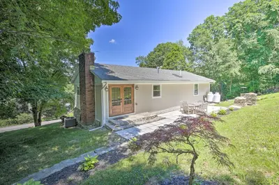 a small white house with a grass yard at Modern NY Home with Views By Hudson Valley Hiking! in Hopewell Junction