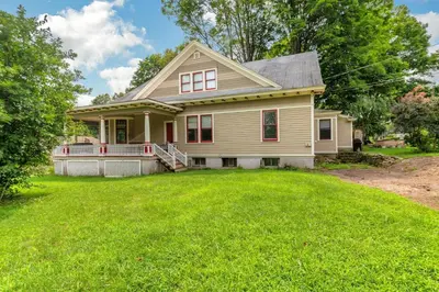 a house with a green lawn in front of it at Mountain View Victorian with Convenient Location and Lots of Space tp Play farmhouse in Napanoch