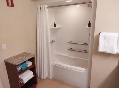 a bathroom with a shower with a shower curtain at Grand Summit Resort, A Vail Resorts Property in Dover