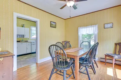 a kitchen and dining room with a table and chairs at Countryside Hideaway - 10 Mi to Cooperstown! in Westford