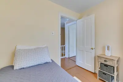 a bedroom with a bed and a tv on a table at Countryside Hideaway - 10 Mi to Cooperstown! in Westford