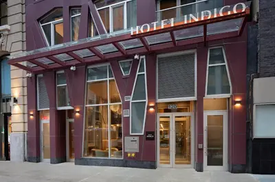 a store front of a building with a sign on it at Hotel Indigo NYC Downtown - Wall Street by IHG in New York