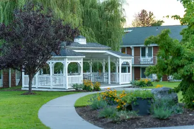 a house with a gazebo in a yard at Sleepy Hollow Hotel in Tarrytown