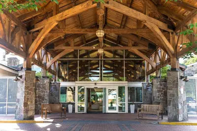 a building with a wooden ceiling and two benches at Sleepy Hollow Hotel in Tarrytown