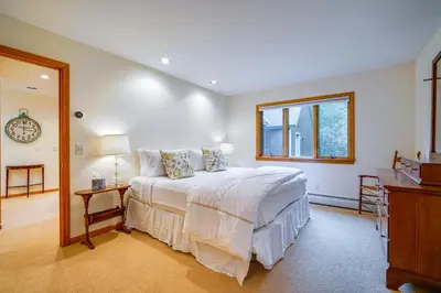 a white bedroom with a bed and a window at Spacious Dover Refuge about 5 Mi to Mount Snow! in Dover