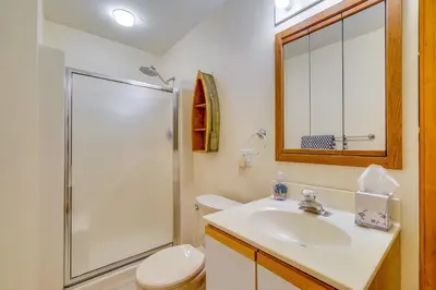 a bathroom with a toilet and a sink and a shower at Spacious Dover Refuge about 5 Mi to Mount Snow! in Dover