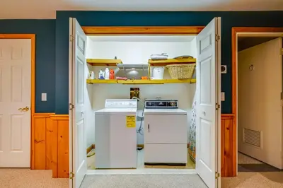 a kitchen with a stove and a refrigerator at Spacious Dover Refuge about 5 Mi to Mount Snow! in Dover