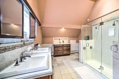 a bathroom with a sink and a shower at Pet-Friendly Latham Retreat about 7 Mi to Albany! in Latham