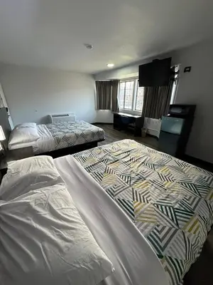 two large beds in a room with at Motel 6-Enfield, CT - Hartford in Enfield