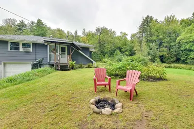 two chairs and a fire pit in a yard at Modern Studio Less Than 13 Mi to Saratoga Racetrack! in Ballston Spa