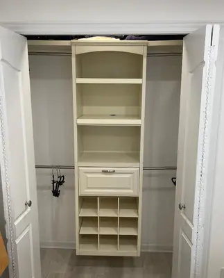 a closet with white shelves and a white door at Renovated Jacuzzi Tub Home NYC-LGA-JFK Washer-Dryer in Kew Gardens
