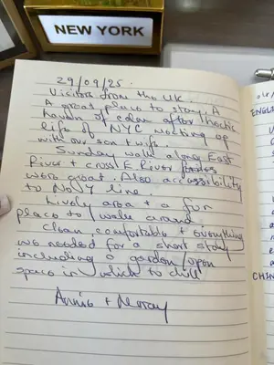 a letter written in handwriting in a notebook at Luxurious Room near LaGuardia & JFK in Corona