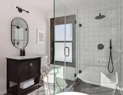 a bathroom with a shower and a toilet and a sink at Acorn Bungalow - Luxury Cabin, Catskills, Windham Mountain, Hunter Mountain in Cairo