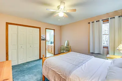 a bedroom with a bed and a ceiling fan at Near Hiking and Skiing Hunter Mountain Getaway! in Elka Park