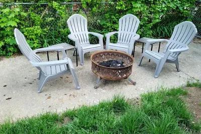 a group of four chairs and a fire pit at Updated Home in the Heart of Saratoga Springs in Saratoga Springs
