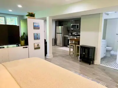 a room with a kitchen and a living room at The Suite at Pound Ridge in Pound Ridge