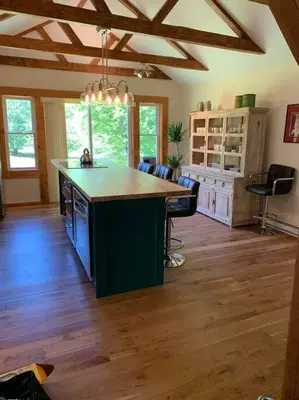 a kitchen with a large island in the middle of a room at Harpersfield House /North West Catskills + sauna in Jefferson