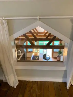 a room with a view of a living room at Harpersfield House /North West Catskills + sauna in Jefferson