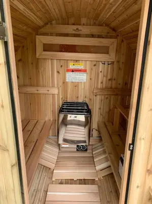an inside view of a small wooden sauna at Harpersfield House /North West Catskills + sauna in Jefferson