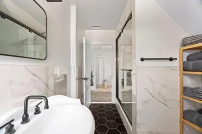 a bathroom with a sink and a shower at Cozy Gem in the Heart of East Rock with FREE Parking near Yale and DT in New Haven