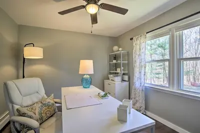a office with a desk and a chair and a window at Stylish Pine Plains Home Near Parks and Hiking! in Pine Plains
