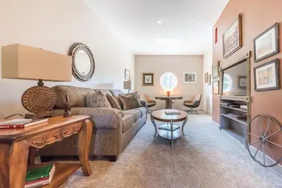 a living room with a couch and a table at Spencertown Inn in Spencertown