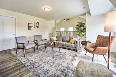 a living room with a couch and chairs at Modern-Chic Athens Home - Fish, Ski and Swim! in Athens