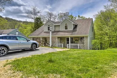 a car parked in front of a house at Family-Friendly Hancock Home Walk to Slopes! in Hancock
