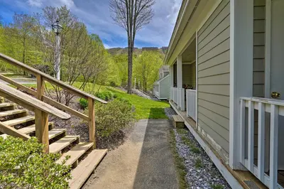 a porch of a house with stairs next to it at Family-Friendly Hancock Home Walk to Slopes! in Hancock