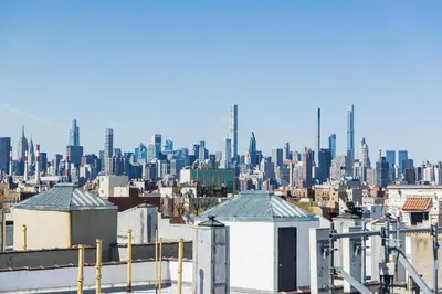 a view of the city from the roof of a building at Astoria Inn LaGuardia Hotel in Queens
