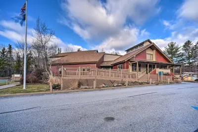 a house on the side of the road at Timber Creek Townhome with 2 Decks and Mtn Views! in West Dover