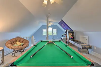 a living room with a pool table and a room with a ceiling at Large Yard and Games Edgewater Escape in Paupack! in Paupack
