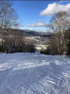 a snow covered slope with trees in the background at Gorgeous Ski On/Off 2 BR Sleeps 8 Jiminy-Must See Luxury in Hancock