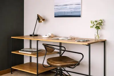 a desk with a chair and a lamp at Dutch Hotel Long Island City New York , Belvilla District 6 Formerly Sonder in Long Island City
