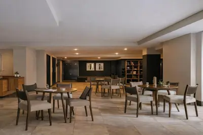 a restaurant with tables and chairs in a room at Dutch Hotel Long Island City New York , Belvilla District 6 Formerly Sonder in Long Island City