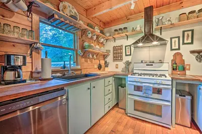 a kitchen with a stove and a sink at Game Room and Hot Tub Pet-Friendly Mount Snow Gem in Dover