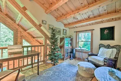 a living room with a christmas tree in a house at Game Room and Hot Tub Pet-Friendly Mount Snow Gem in Dover