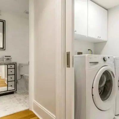a white washer and dryer in a bathroom at Spectacular vacation home with excellent location in New York in New York