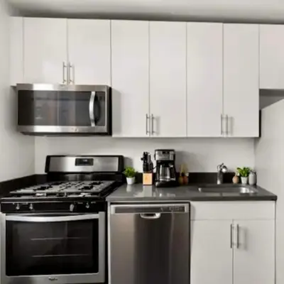 a kitchen with a stove and a microwave at Family Apartment in Excellent Sector of New York in New York